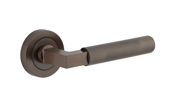 Brunswick Lever - Round Rose Signature Brass